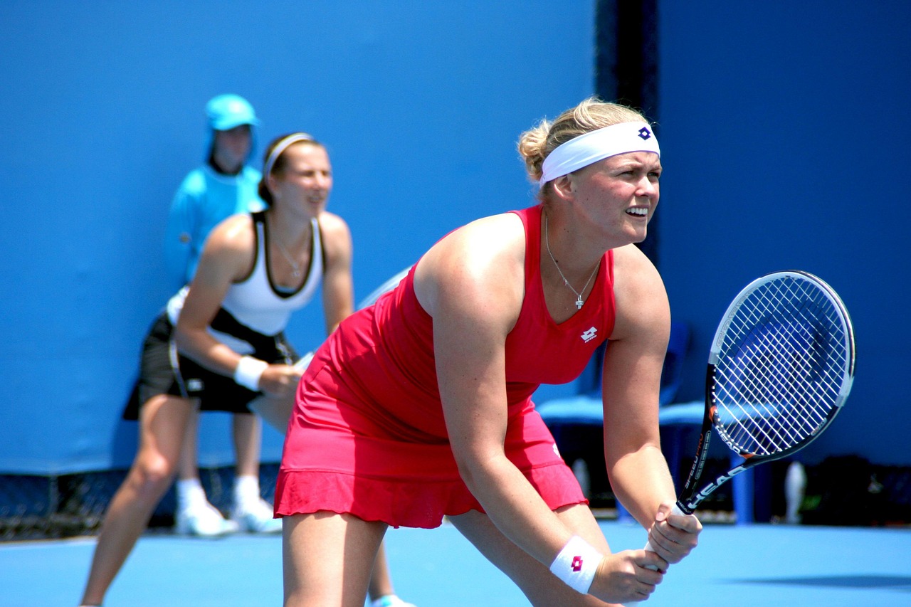 terrain de tennis terre battue joueuses double